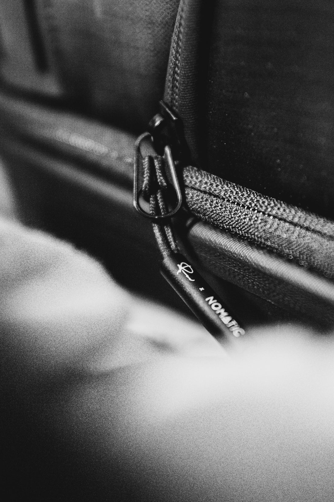 a black and white photo of a piece of luggage